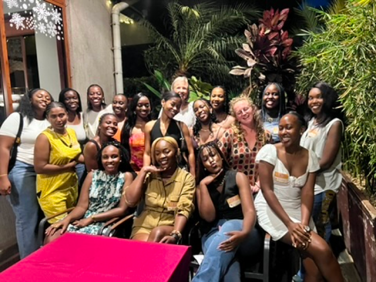 Suki community group photo at an evening event