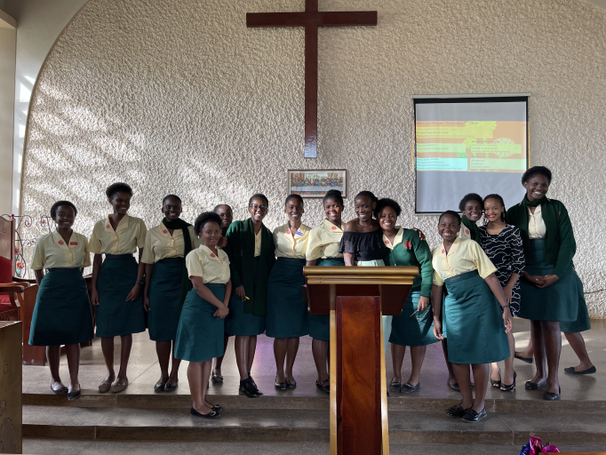 Suki team with students after a wellness talk